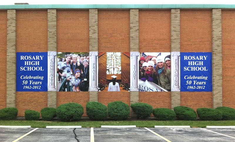 Rosary High School banners on a building