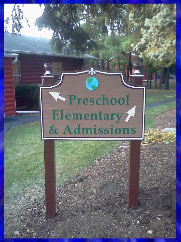 Carved preschool directional sign